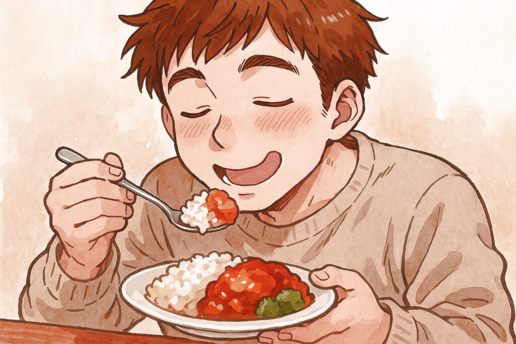 美味しそうにカレーを食べる男性