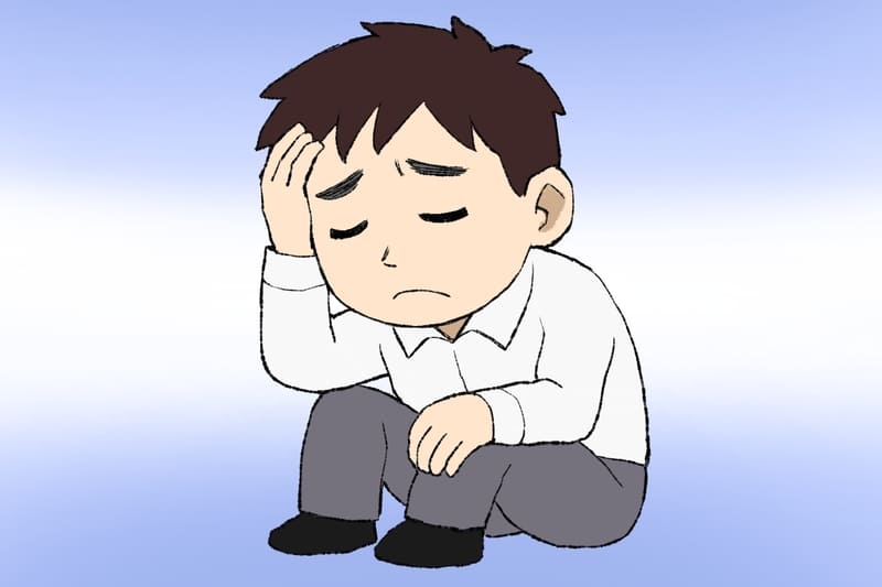 一人で思い悩む男性